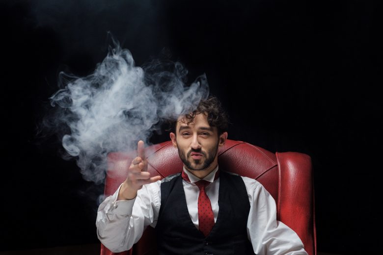 Concept of stress with businessman and smoke in head