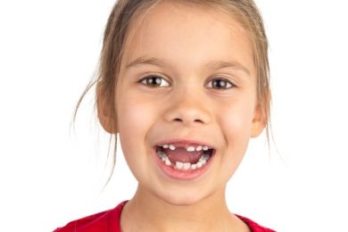 should I pull-out a loose baby tooth